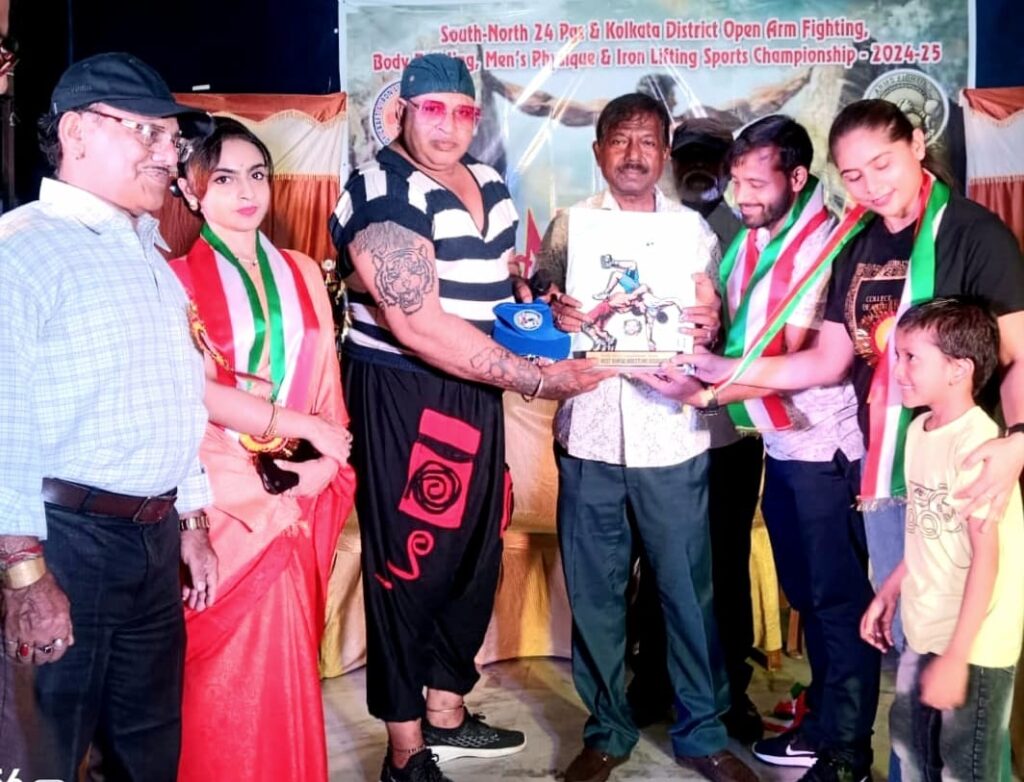 ওয়েস্ট বেঙ্গল আয়রন লিফটিং এসোসিয়েশন এবং অশোক আখড়া এক ব্যায়াম মন্দির এর উদ্যোগে অনুষ্ঠিত হলো  ওপেন ডিস্ট্রিক্ট আয়রন লিফটিং, আর্ম ফাইটিং, যোগা, ডান্স এবং বডি বিল্ডিং চ্যাম্পিয়নশিপ ২৪-২৫